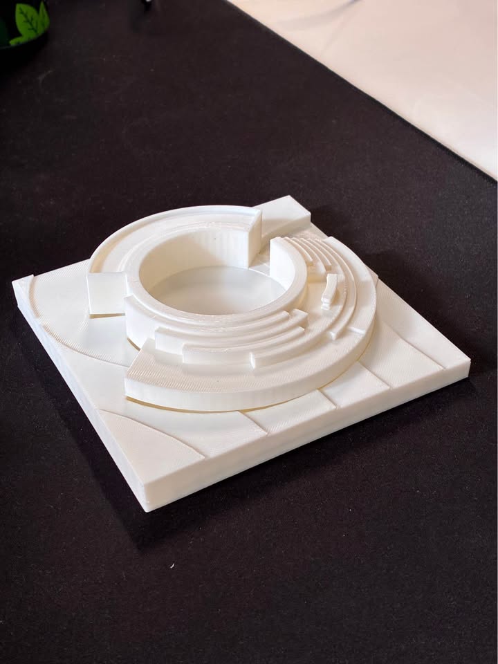 White circular architectural model