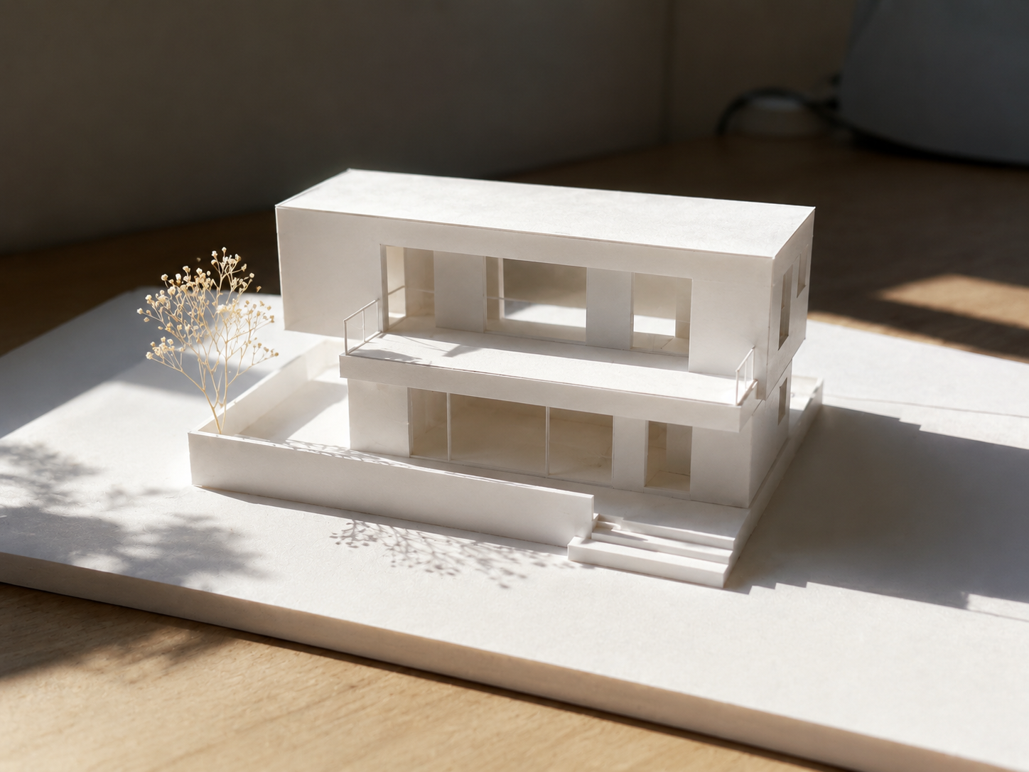 White architectural house model in sunlight